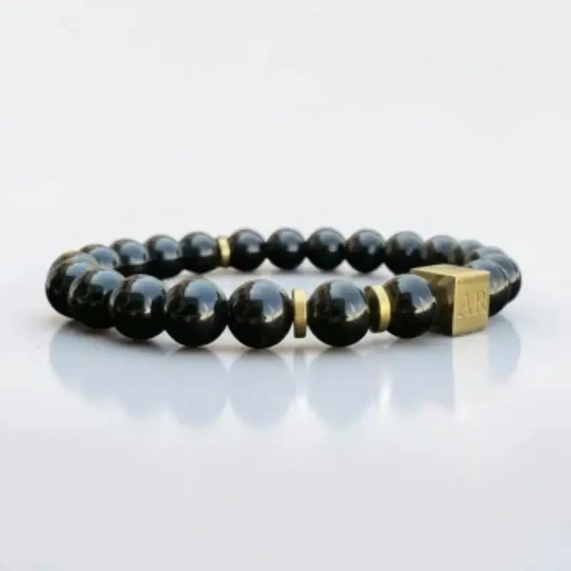 Pulsera de Ónix Negro Brillante elástica 8mm oro 18k para Hombre